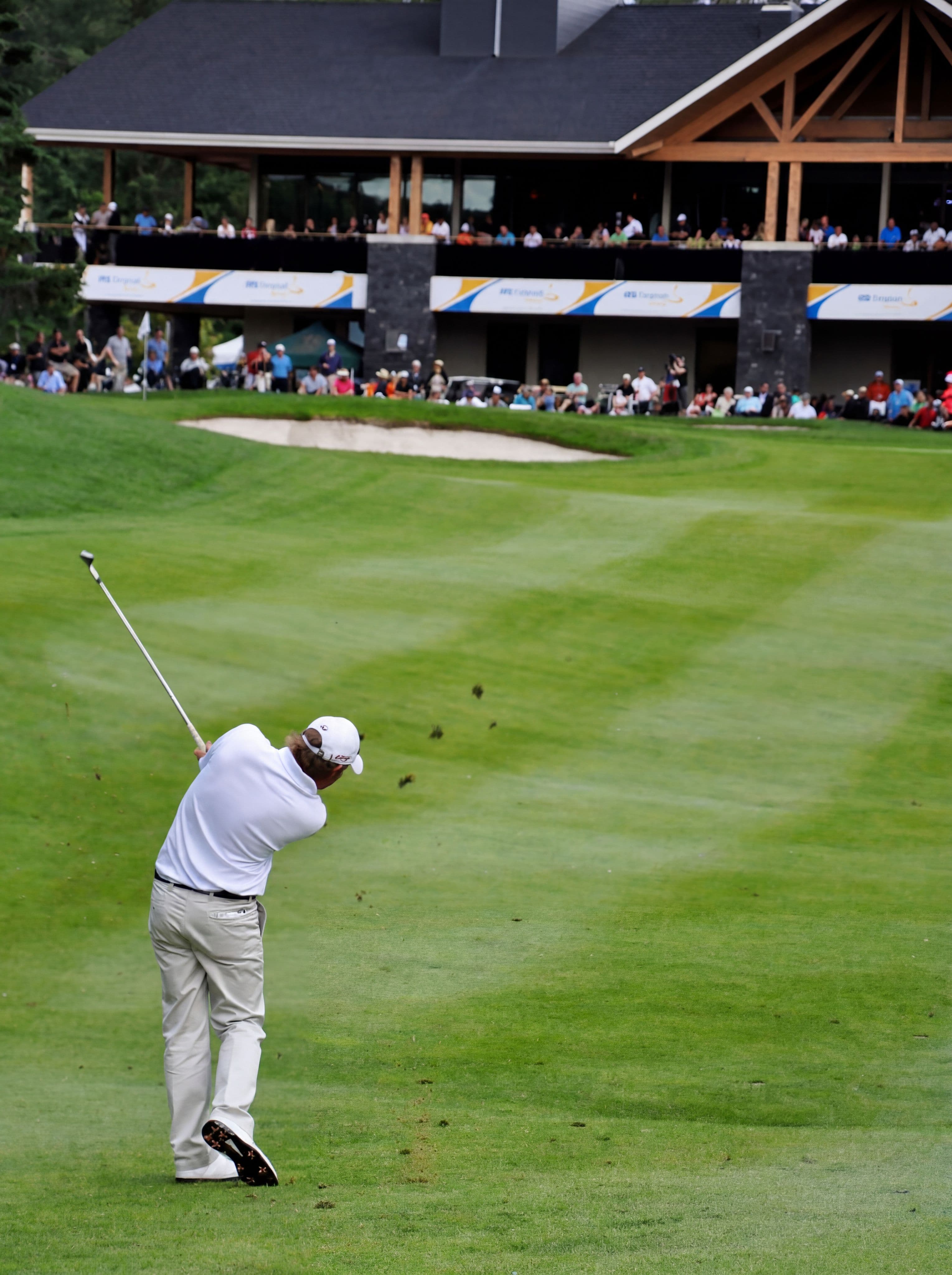 Steven Lecuyer striking a shot from the fairway in tournament play