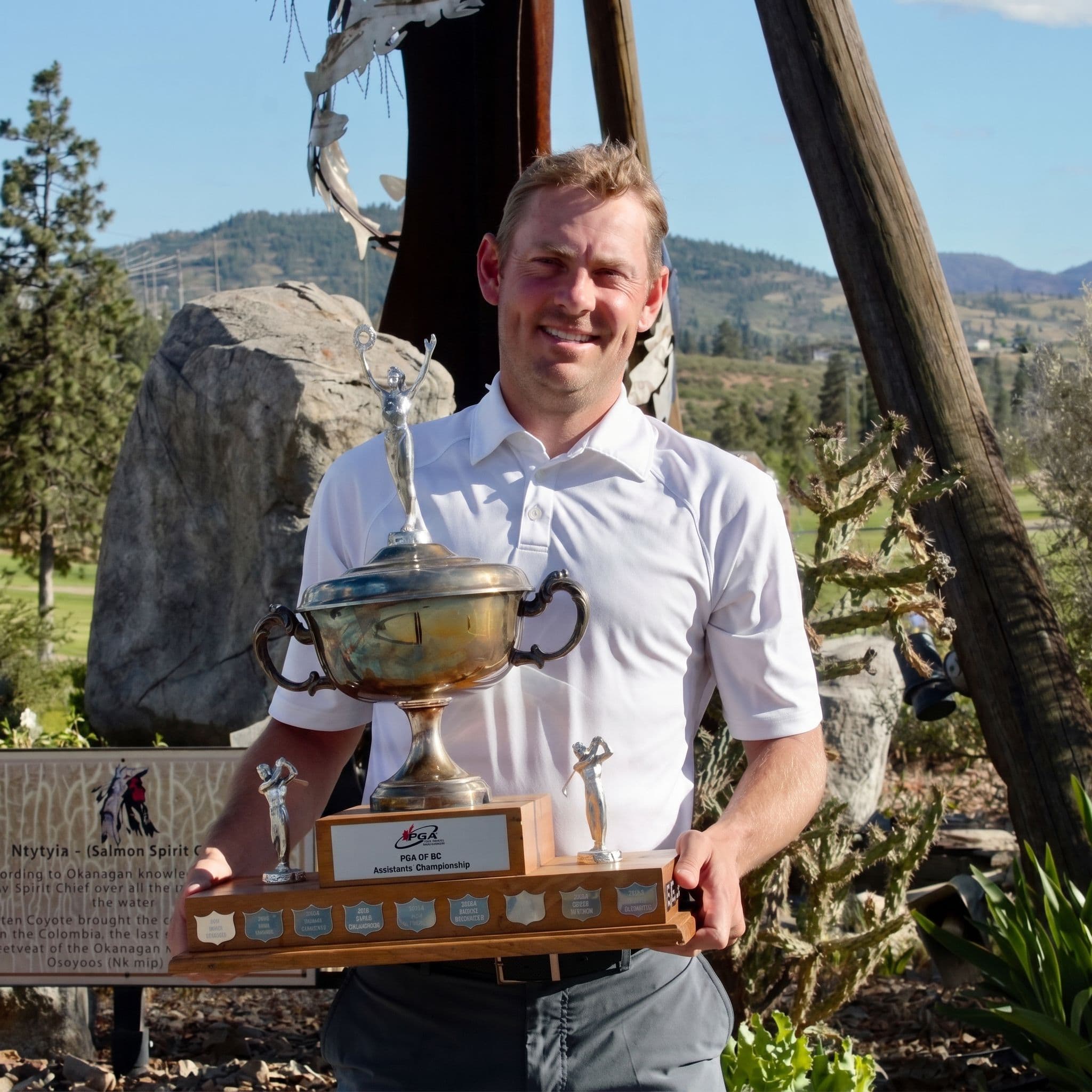 Steven Lecuyer with the PGA of BC Assistants' Championship trophy